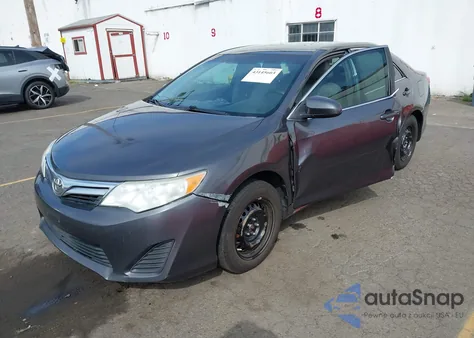 2012 Toyota Camry Le z USA, uszkodzony, nr VIN 4T4BF1FK2CR181039